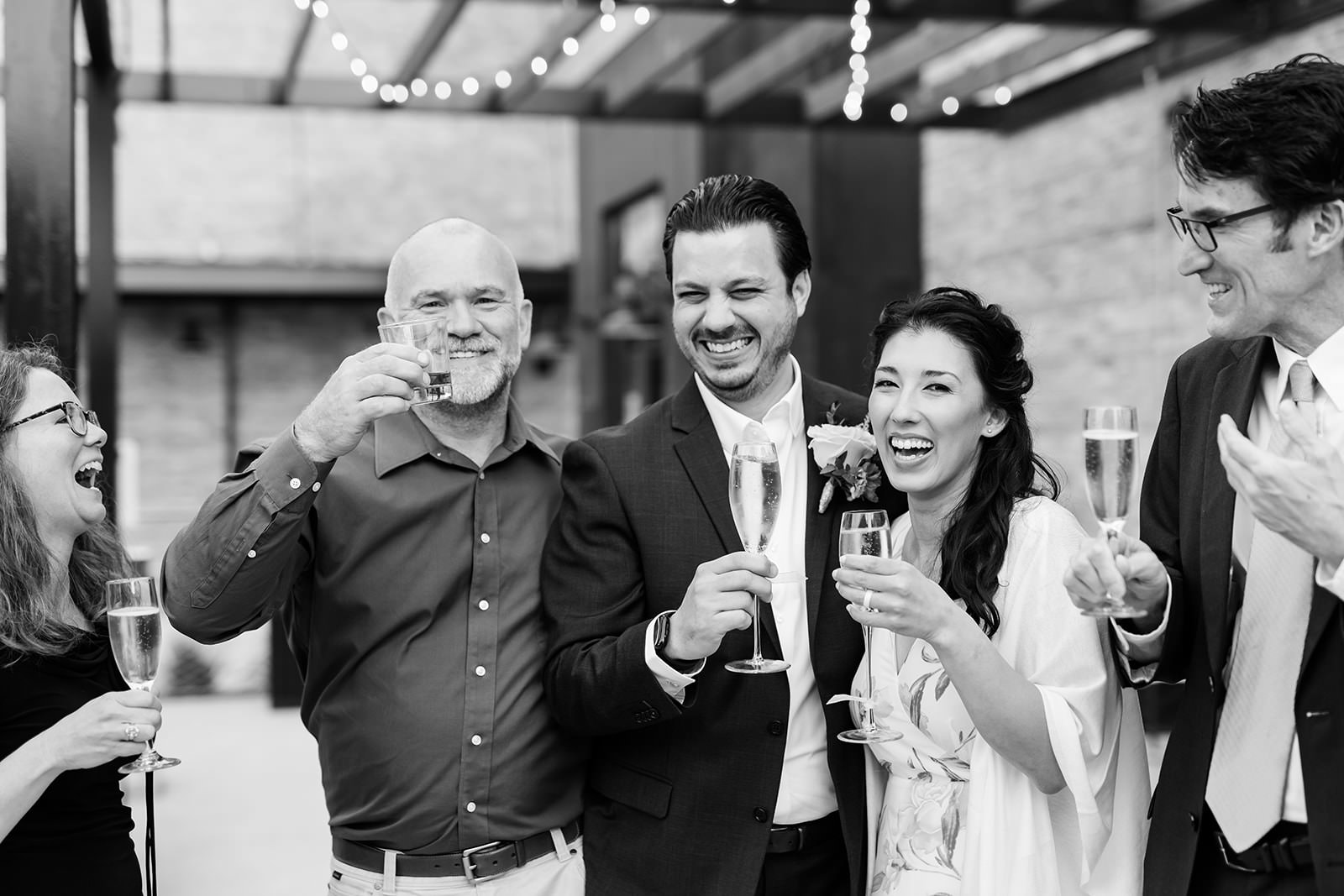 wedding-guests-toast-madison-wisconsin